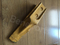 Denti e adattatori per cestello Caterpillar per dente di rondine 1462201m1