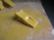 Parti Denti per benna standard Dente Doosan 2713-00057